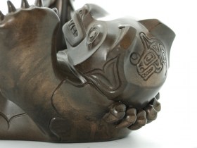 Cold Cast Bronze bear catching salmon by artist Michael McLean