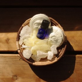 Haida Sun and Moon bath fizzer with rock salts and essential oil mist in antique basket